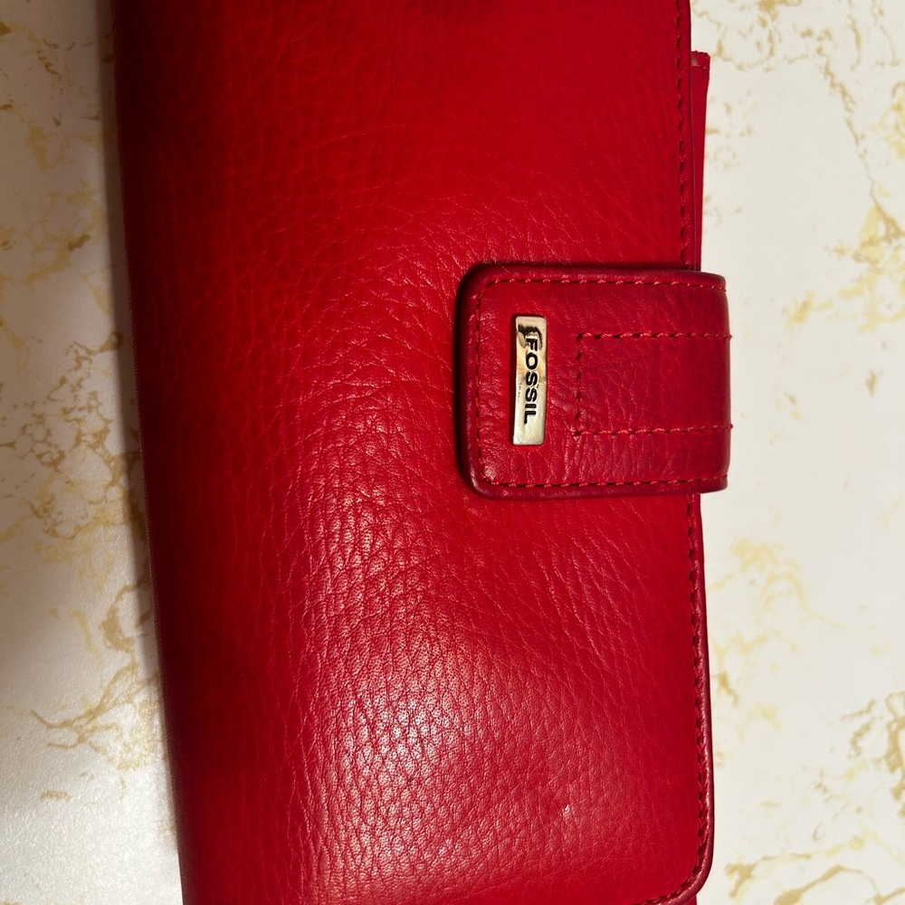 Fossil red leather hardly used wallet.